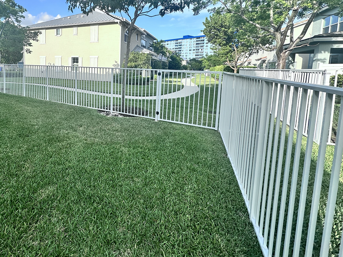 White Mechanical Aluminum Fence in Broward County