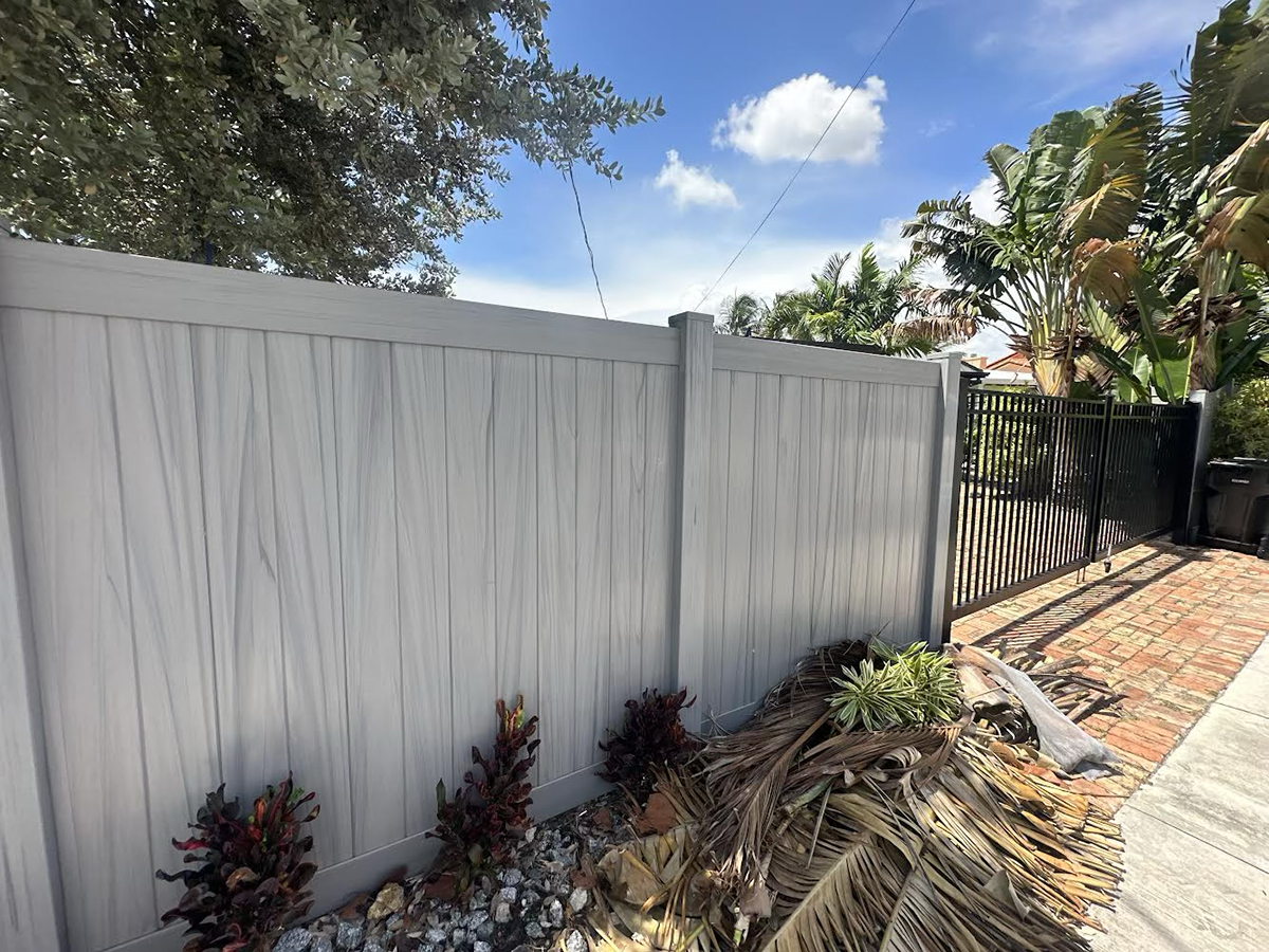 Coastal Cedar PVC Privacy Fence with Custom Aluminum Swing Gates in Fort Lauderdale